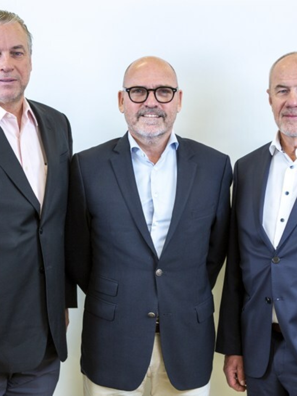 Trois membres de l'équipe de Groupe Almaco